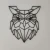 sowa-geometryczna-dekoracja-na-sciane.webp